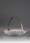 A Chinese porcelain famille rose plate with silver handle