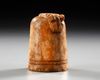 A NISHAPUR IVORY CHESS PIECE, PERSIA, 11TH-12TH CENTURY