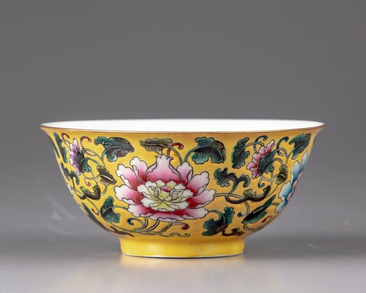 A yellow ground famille rose bowl