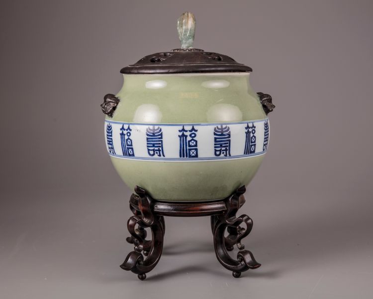 A Chinese celadon-ground blue and white jar