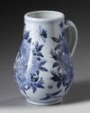 A JAPANESE ARITA BLUE AND WHITE JUG, 17TH CENTURY
