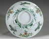 A CHINESE FAMILLE VERTE 'CRANE AND PEACH' BOWL