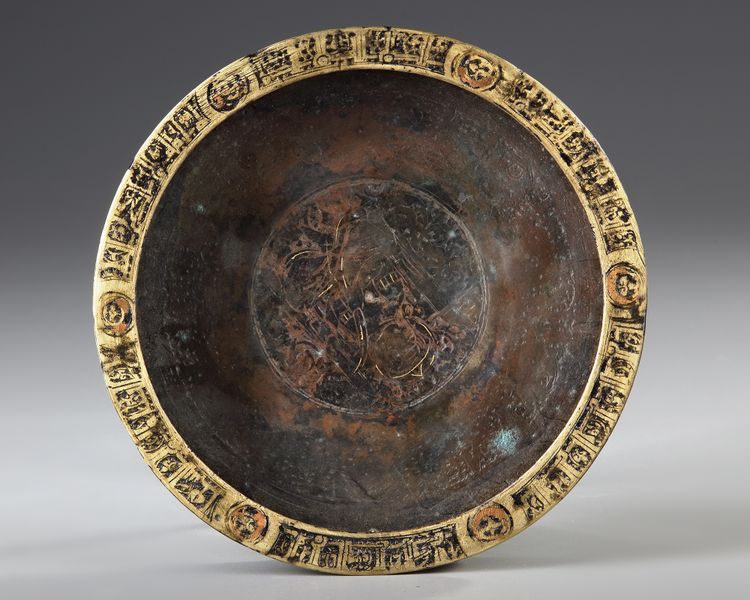 A KHURASAN COPPER INLAID BRONZE DISH, PERSIA SELJUK, 12TH CENTURY