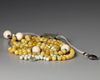 A CHINESE PEKING GLASS OFFICIAL NECKLACE (CHAOZHU), 19TH-20TH CENTURY