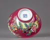 A ruby-ground famille rose bowl