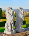 A PAIR OF ITALIAN SCULPTED WHITE MARBLE MODELS OF SEATED LIONS, PROBABLY LATE 19TH CENTURY