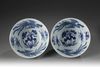 A pair of blue and white 'dragon and phoenix' bowls