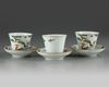 Three pairs of Chinese famille verte cups and saucers