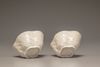 A pair of white-glazed lobed cups