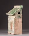A Chinese green-glazed pottery store house