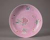 A famille-rose pink-ground sgraffiato dish
