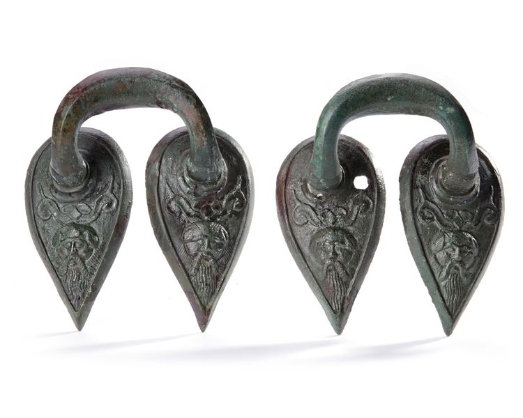 A PAIR OF HANDLES FROM A GREEK VESSEL, 6TH-5TH BC