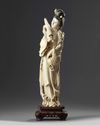 A large Chinese ivory carving of a lady holding a parasol