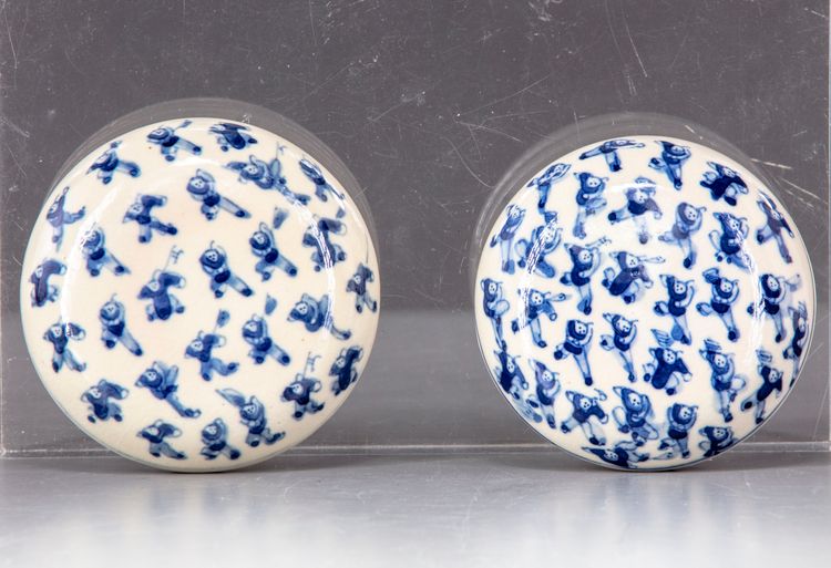 Two Chinese blue and white boys boxes and covers