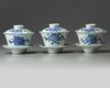 Three sets of Chinese blue and white bowls, covers and saucers