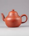 A Chinese Yixing teapot and cover