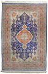A HIGHLY IMPORTANT AND RARE SIGNED HEREKE SILK CARPET
