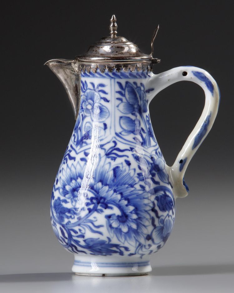 A CHINESE BLUE AND WHITE SILVER MOUNTED MILK JUG, KANGXI (1662-1722)