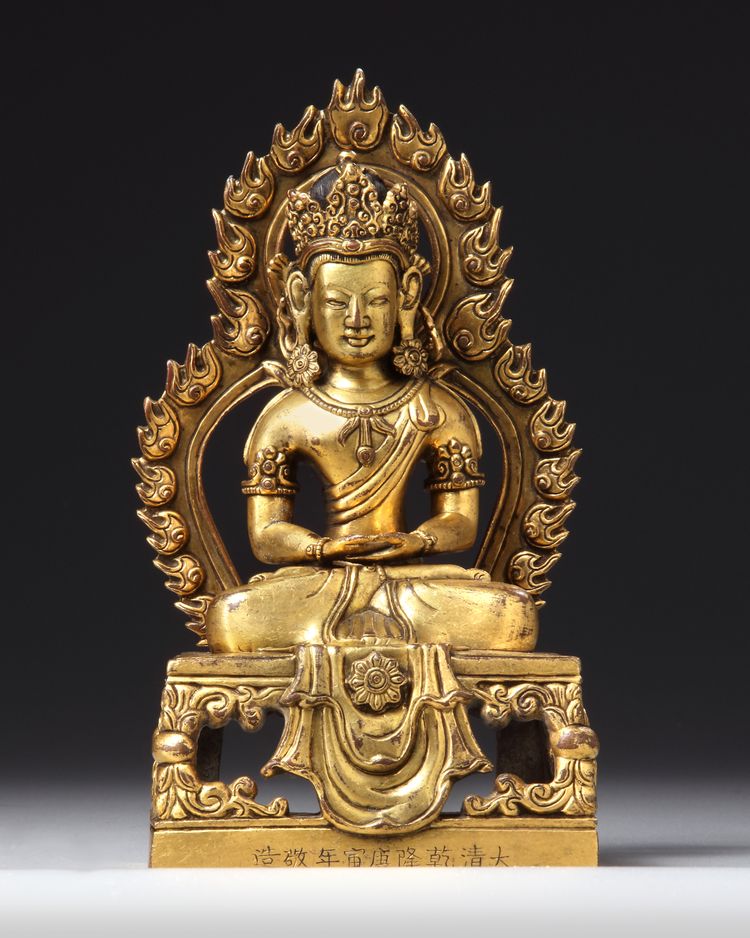A CHINESE GILT BRONZE SEATED FIGURE OF BUDDHA AMITAYUS