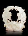 A CHINESE GREEN JADE TWIN-EAGLE PLAQUE,  POST-SHIJIAHE CULTURE (CIRCA 2000–1800 BC)