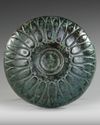 AN ACHAEMENID BRONZE DECORATED PHIALE, CIRCA 6TH-4TH CENTURY B.C.