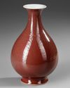 A CHINESE COPPER-RED GLAZED PEAR-SHAPED VASE, 19TH CENTURY