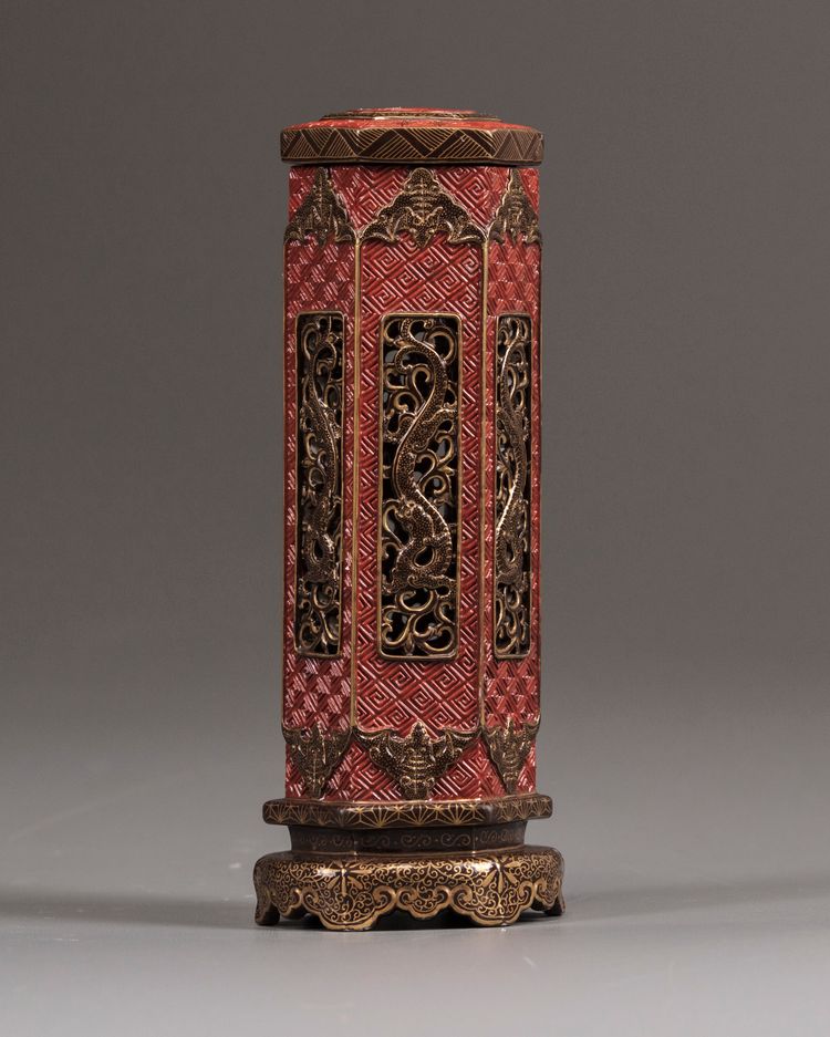 An Chinese openwork red-ground hexagonal incense burner, cover, and stand