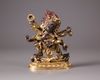 A Sino-Tibetan gilt bronze figure of Sadbhuja Mahakala