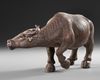 A CHINESE TERRACOTTA BULL, 19TH-20TH CENTURY