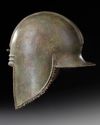 A GREEK BRONZE ILLYRIAN HELMET, CIRCA 6TH-5TH CENTURY B.C.