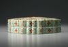 A Turquoise-Ground Famille-Rose Shaped Box and Cover
