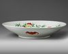 A CHINESE FAMILLE ROSE PEACHES DISH, 20TH CENTURY