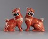 A pair of Chinese iron red glazed fu lions