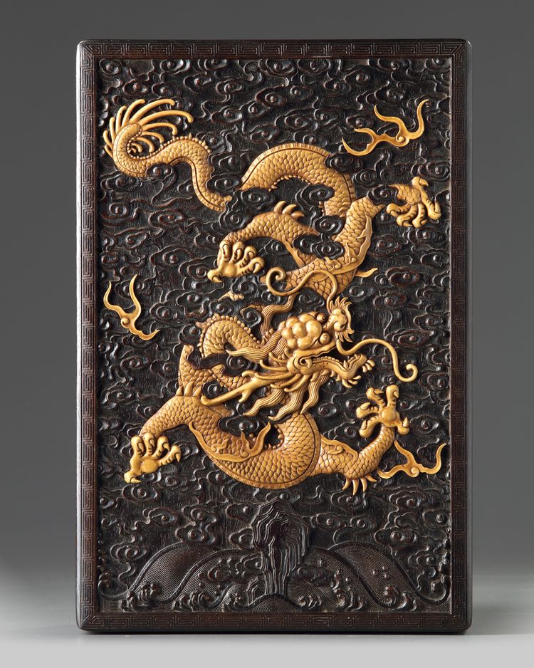 A Chinese carved and gilt zitan box and cover