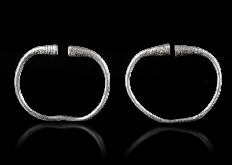 A PAIR OF PRE ACHAEMENID SILVER BRACELETS, CIRCA 8TH-7TH CENTURY B.C.