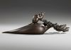 A DARK BRONZE OKIMONO SHOWING A LARGE MOUSE ON A DAIKON RADISH, EARLY 20TH CENTURY
