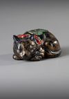 A JAPANESE BLACK SLEEPING CAT, KUTANI, LATE 19TH CENTURY