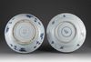 Two blue and white chargers