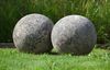 A LARGE PAIR OF LIMESTONE ORNAMENTAL SPHERES, LATE 20TH CENTURY