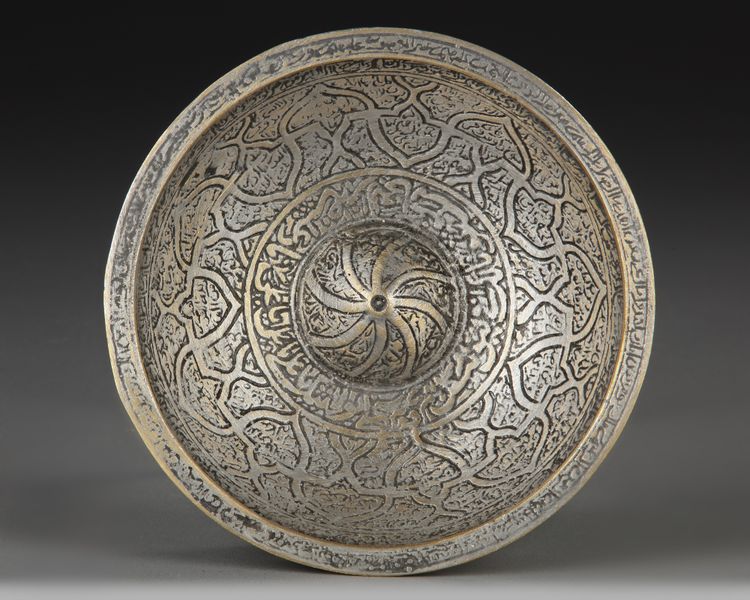 A BRASS MAGIC BOWL, PERSIA, 19TH CENTURY