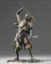 A Japanese bronze figure of a samurai