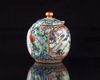 A Chinese green-ground famille rose 'Hui Mountain Retreat' teapot and cover
