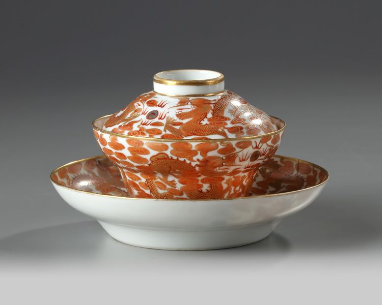 A CHINESE IRON-RED AND GILT-DECORATED 'DRAGON' OGEE BOWL, COVER AND SAUCER, GUANGXU PERIOD (1875-1908)