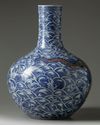 A LARGE CHINESE UNDERGLAZE COPPER RED AND BLUE AND WHITE 'DRAGON' VASE, QING DYNASTY (1644-1911)