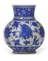 THE STYLE OF BABA NAKKAS IZNIK BLUE AND WHITE JAR, 20TH CENTURY