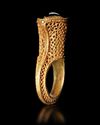 A MAGNIFICENT EARLY ISLAMIC GOLD RING,  NEAR EAST 10TH-11TH CENTURY