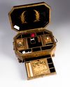 A Chinese gilt and black lacquered box and cover