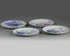 Four Chinese underglaze copper red blue and white 'floral' dishes