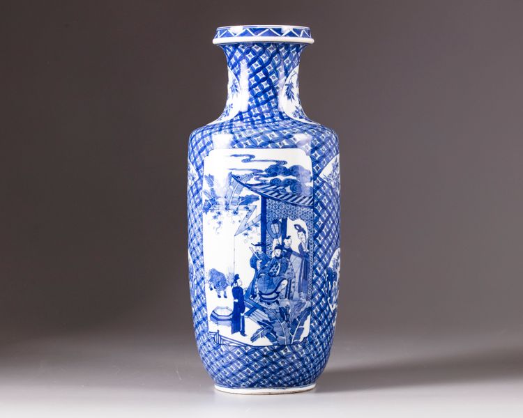 A blue and white rouleau vase