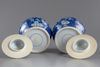 A pair of blue and white Chinese 'cherry blossom' vases and covers